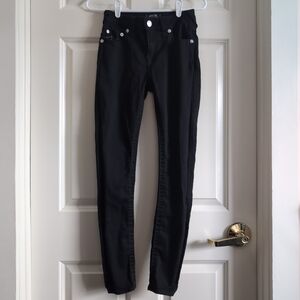 Black low rise 2010s curvy True Religion skinny jeans with grey contrast stitch